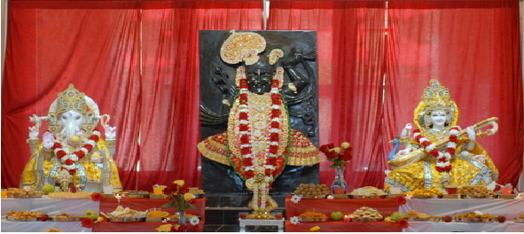 Sanctum with deities and offerings